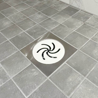 Self-cleaning replaceable floor drain cover